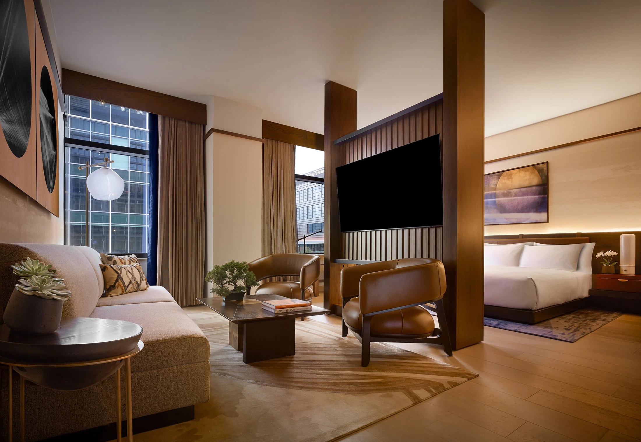 hotel room with brown and beige modern furniture